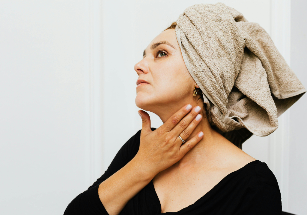 woman applying skincare