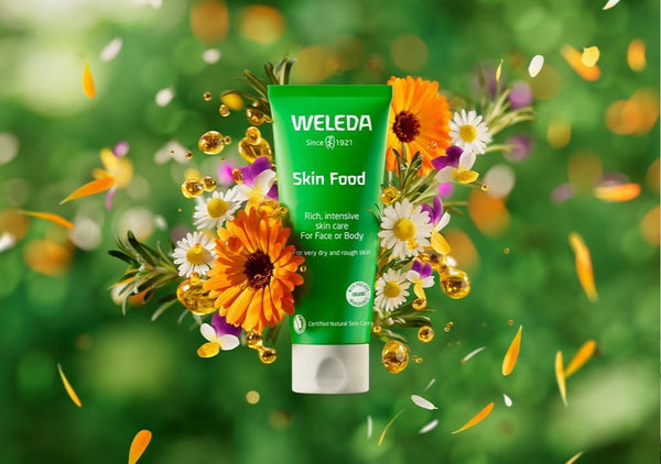 weleda skin food surrounded by flowers