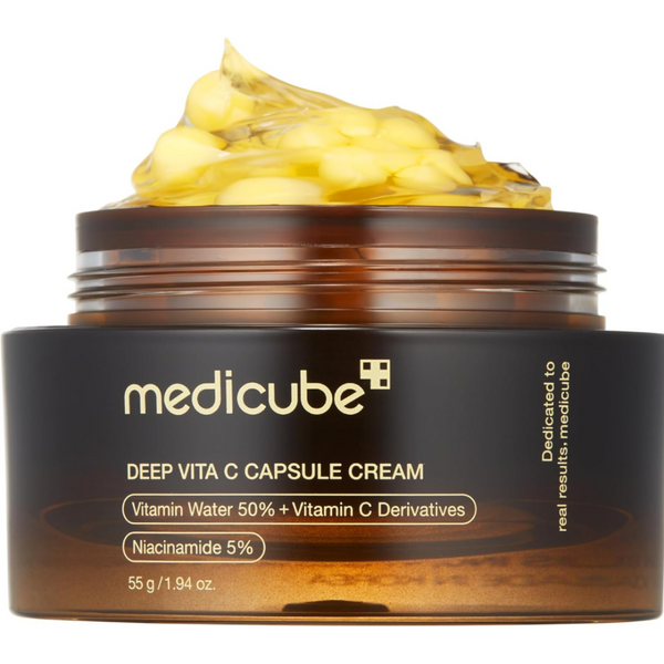 Medicube Deep Vita C Capsule Cream jar with cream on top on a white background