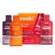 Zooki collagen powder packets in various flavors on a white background