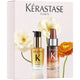 Kérastase hair care product set with flowers on a light pink background