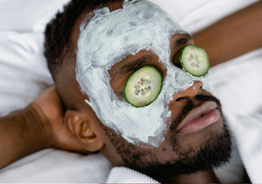 man laying down with a facemask on