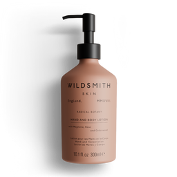 Brown lotion bottle with pump and 'Wildsmith' branding on a white background