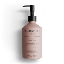 Pink bottle of Wildsmith Skin hand and body wash on a white background