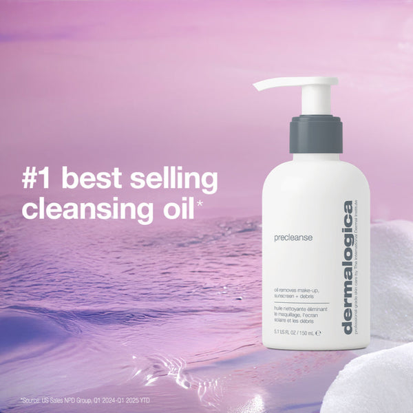 A white pump bottle of Dermalogica Precleanse cleansing oil stands on a pink and purple water-textured background with large text reading '#1 best selling cleansing oil'.