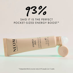 NEOM Energy Pen with text about being a pocket-sized energy boost on a light background