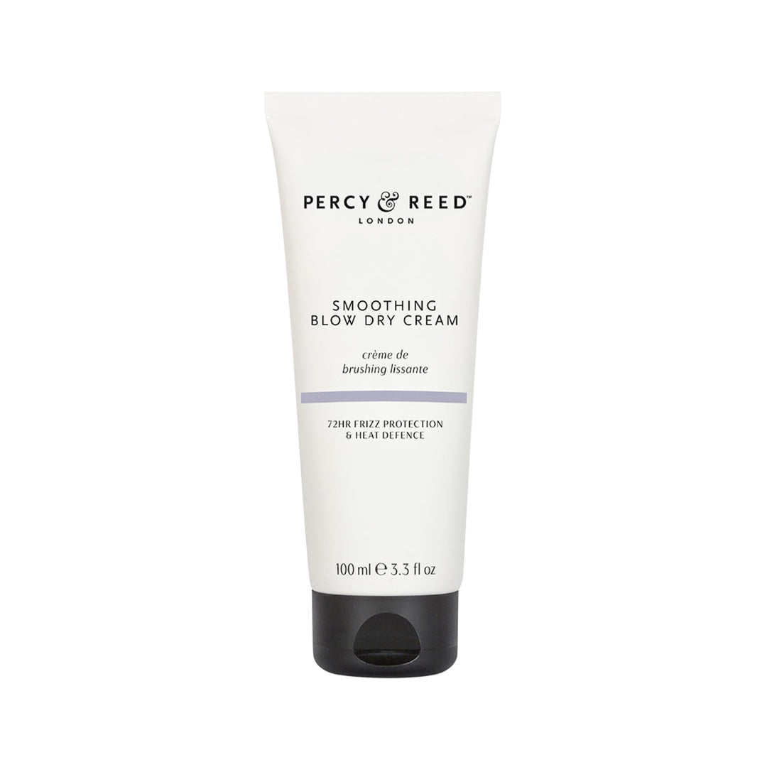 Percy & Reed London Smoothing Blow Dry Cream in a white squeeze tube with a black flip-top cap, shown on a plain white background.