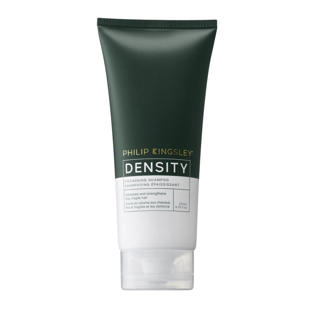 Tube of Philip Kingsley Density shampoo on a white background