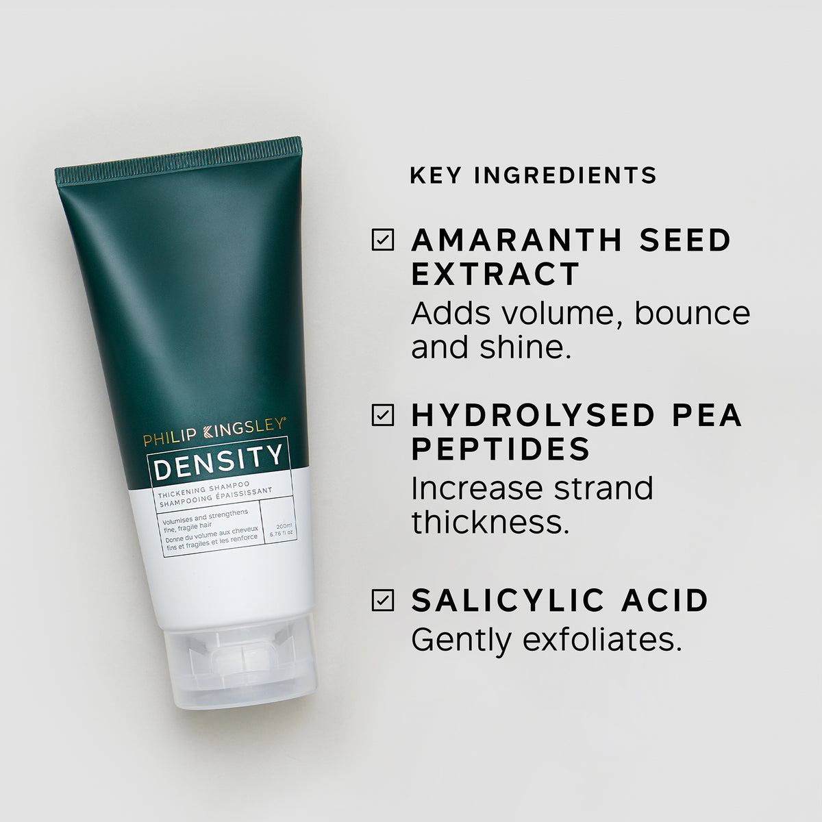 Tube of Philip Kingsley Density hair product with key ingredients listed on a light gray background
