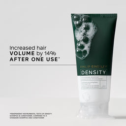 Tube of Philip Kingsley Density shampoo with text on increased hair volume on a white background