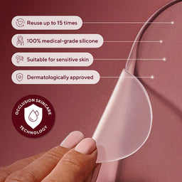 Silicone product held by a hand with features listed on a maroon background