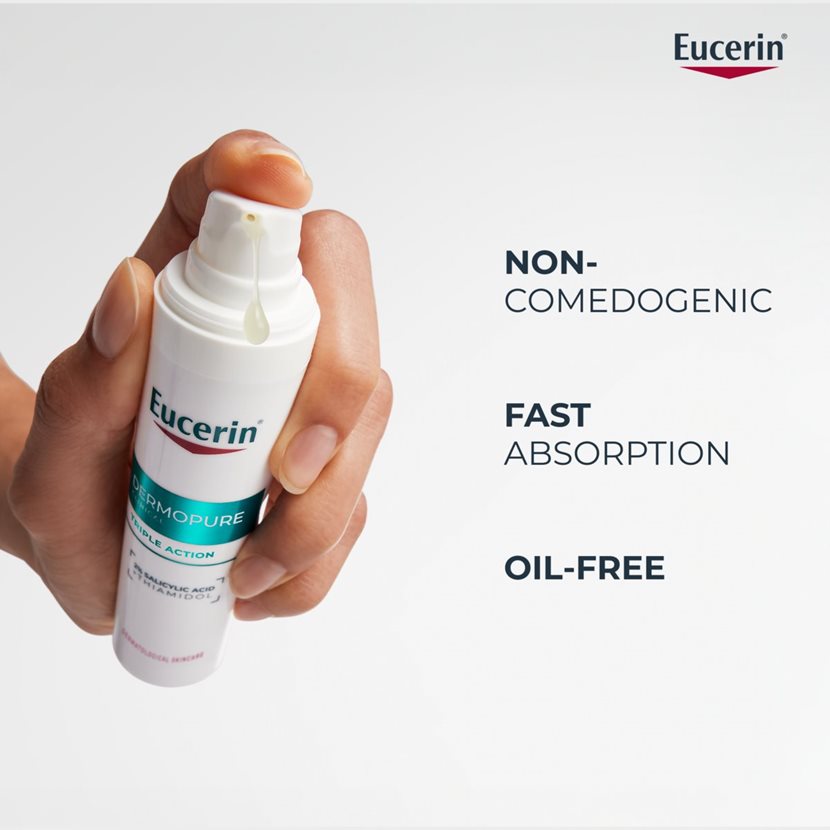 Eucerin Dermopure spray held in a hand with product features listed on a white background