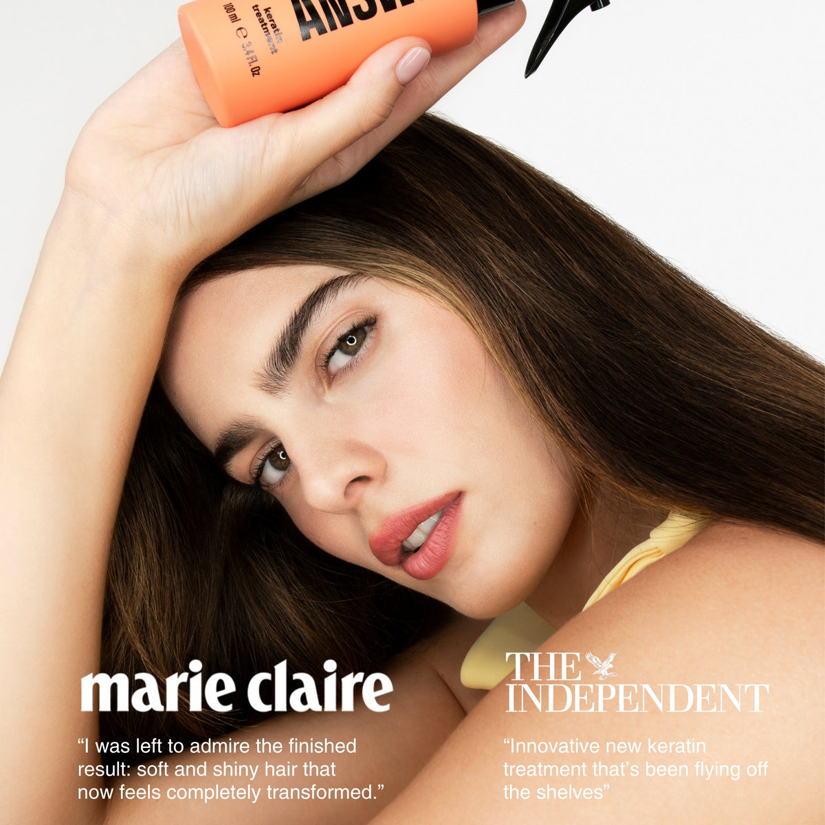 Woman holding a bottle of 'ANSWR' hair product with text from 'marie claire' and 'The Independent'.