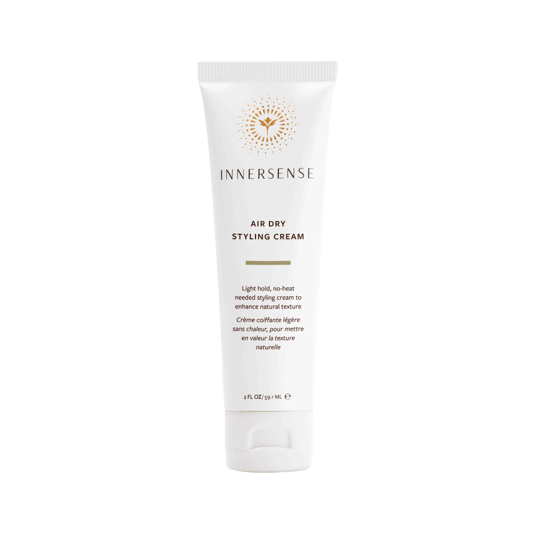 Innersense air dry styling cream tube on a white background