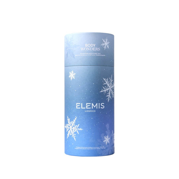 Blue cylindrical Elemis product packaging with snowflake designs on a white background