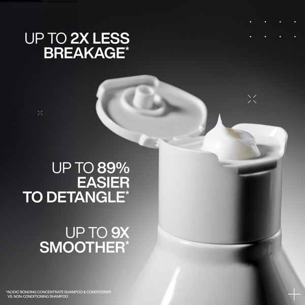 Shampoo and conditioner bottle with product on a black background