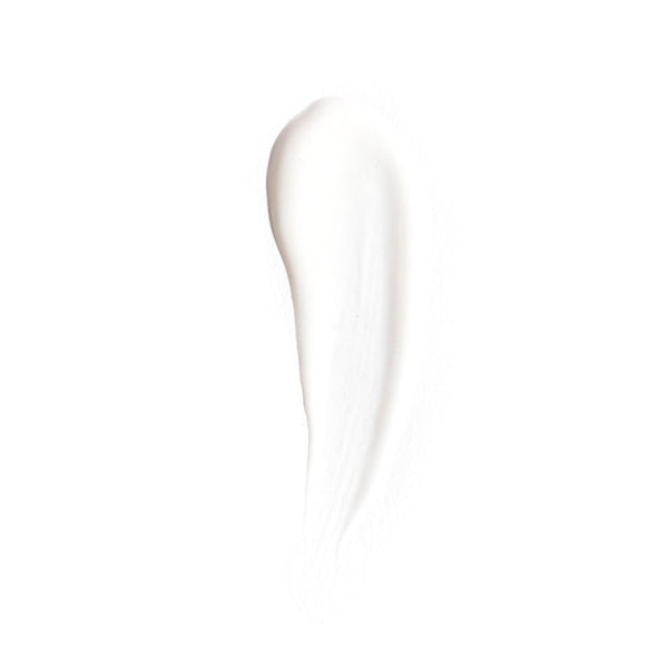 A thick, smooth swipe of white cream or cosmetic product on a solid white background.