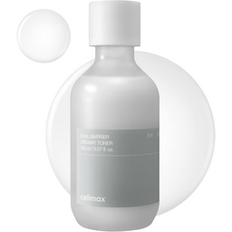 A frosted white cosmetic bottle labeled 'cellimax DUAL BARRIER CREAMY TONER' with a gray label band, shown on a white background with soft circular translucent shapes behind it.