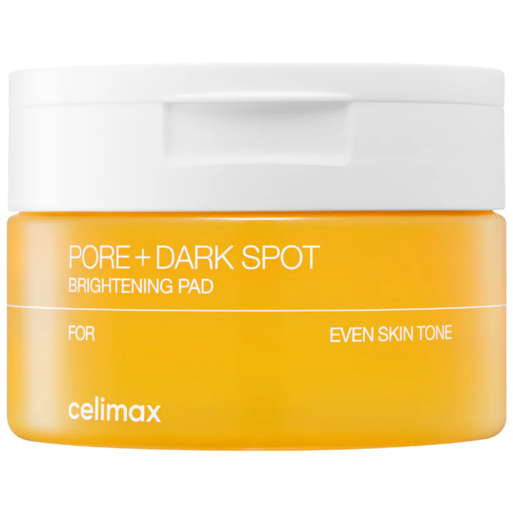 A jar of Cellimax Pore + Dark Spot Brightening Pad with a bright yellow-orange body and a white lid, shown on a plain white background.