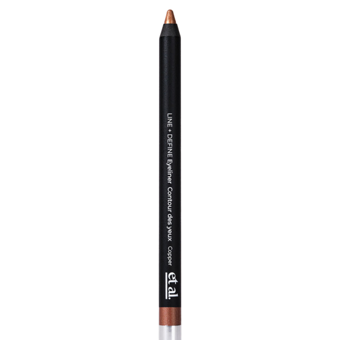 Eyeliner pencil with black casing and copper tip on a light gray background
