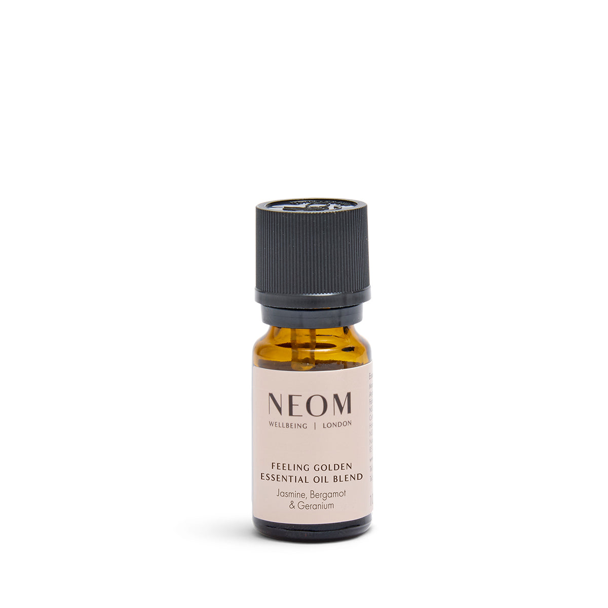 A small amber glass bottle of NEOM Wellbeing 'Feeling Golden' essential oil blend with a black cap and a beige label, centered on a white background.