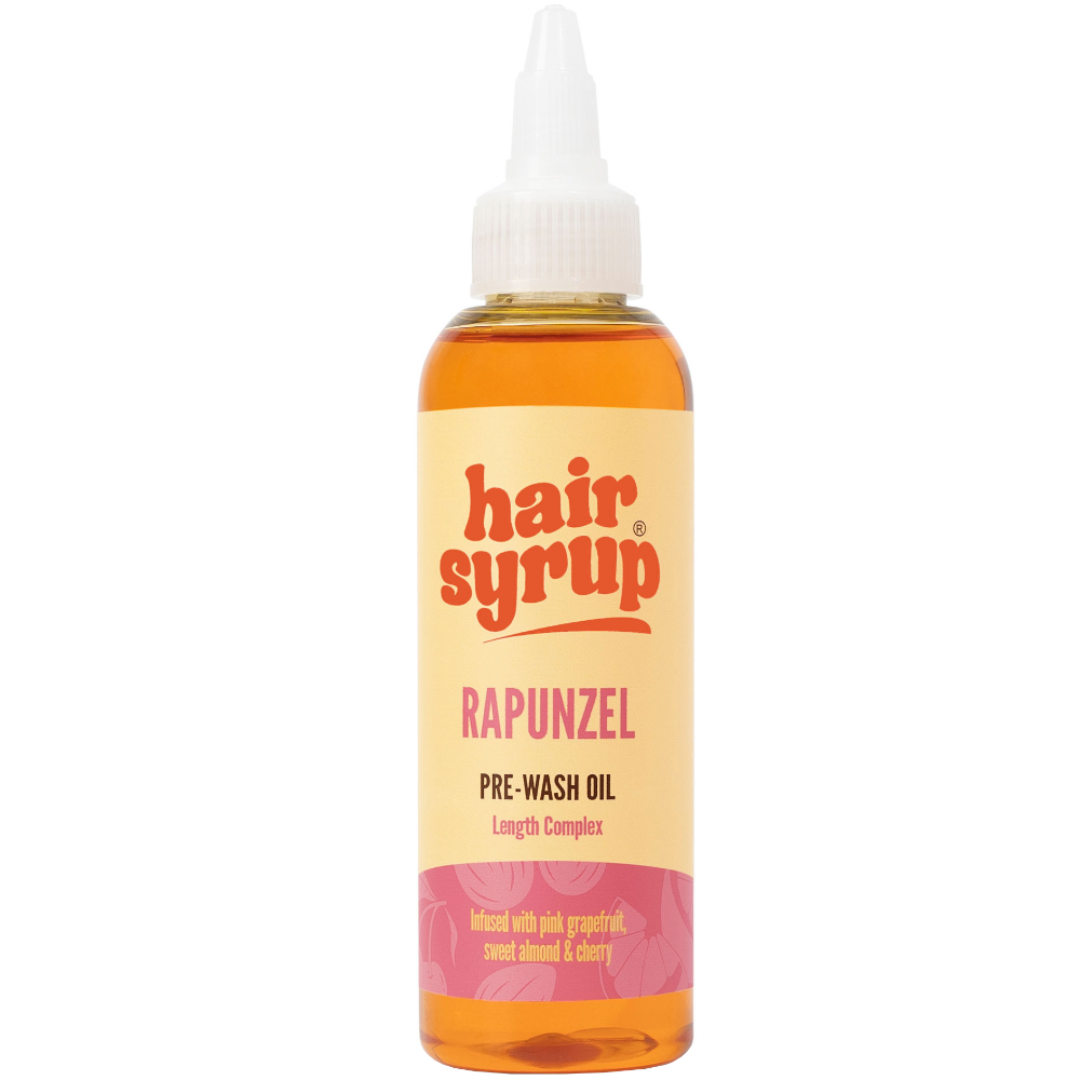 Bottle of hair syrup with a yellow label on a white background