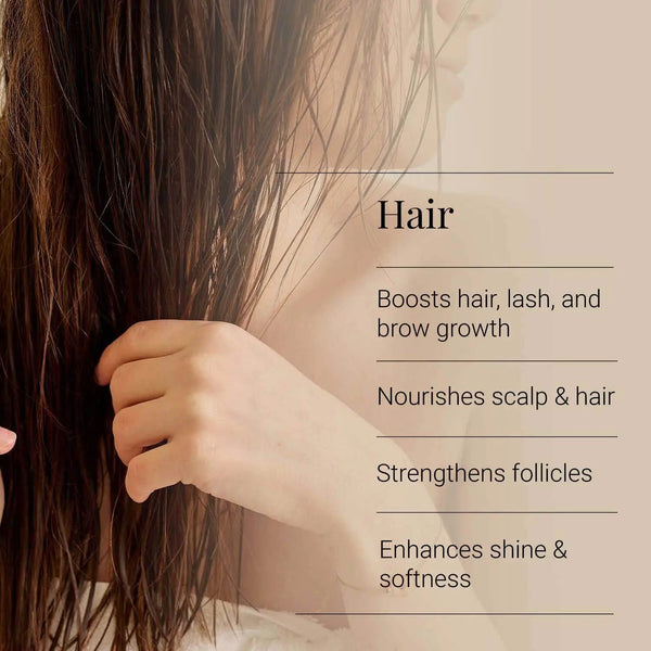 Close-up of a hand holding hair with text about hair benefits on a beige background