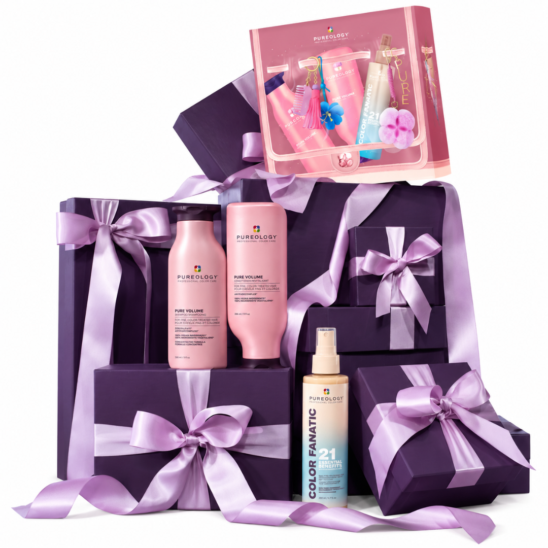 A curated haircare gift set from Purifylogy, featuring pink and lavender hair color products arranged in and around dark purple gift boxes with lavender satin ribbons, on a clean white background.