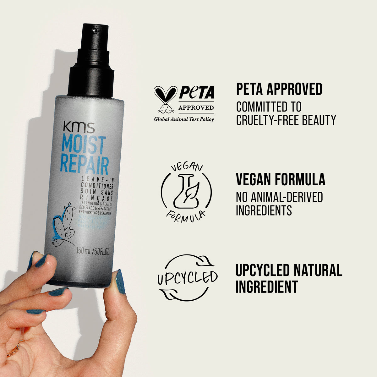 KMS Moist Repair bottle held by a hand with PETA approval and vegan formula labels on a light gray background