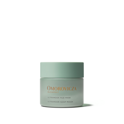 A single jar of Omorovicza Budapest Ultramoor Mud Mask in a matte sage green container with gold lettering, centered on a clean white background.