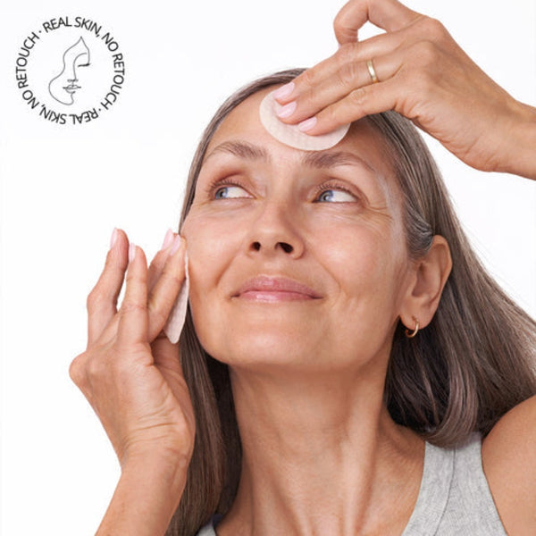 a model using the pads on her face