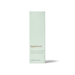 A tall, slender pale mint green box for Omorovicza Bio系列 Refining Facial Polisher, shown on a clean white background with a soft shadow.