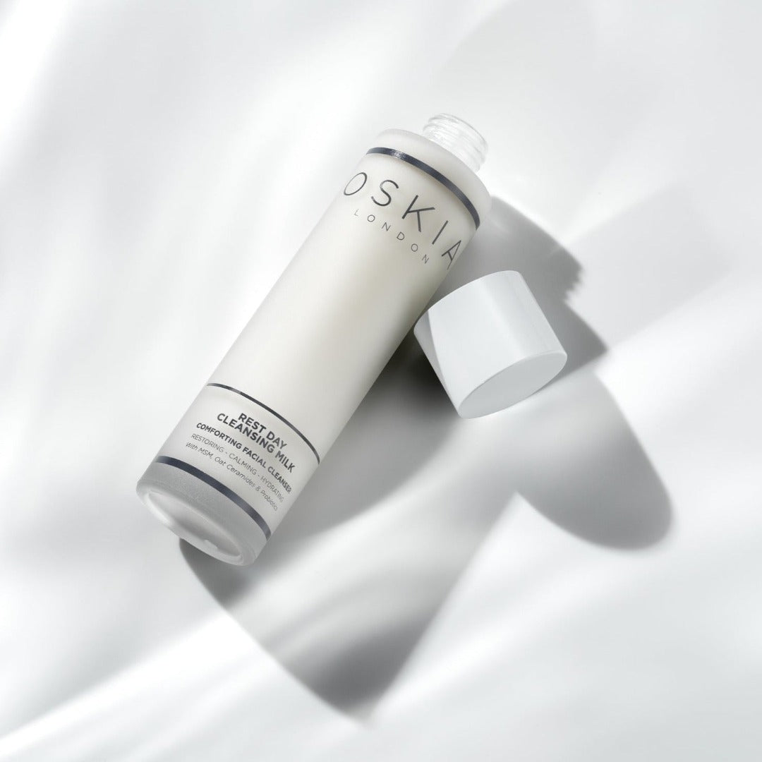 OSKIA SPF30 Vitamin Body Milk bottle on a white surface 