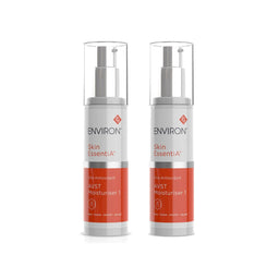 Two ENVIRON Skin EssentiA AVST Moisturiser 1 pump bottles with clear protective caps, shown side by side on a white background.