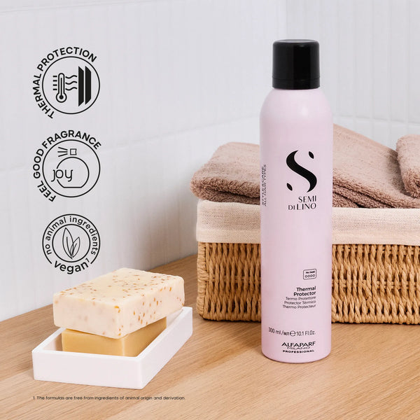 Stai di Lino hair product bottle with a sponge and towels on a wooden surface