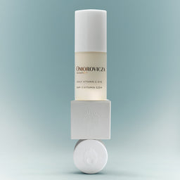 Omorovicza skincare bottle on a light blue background