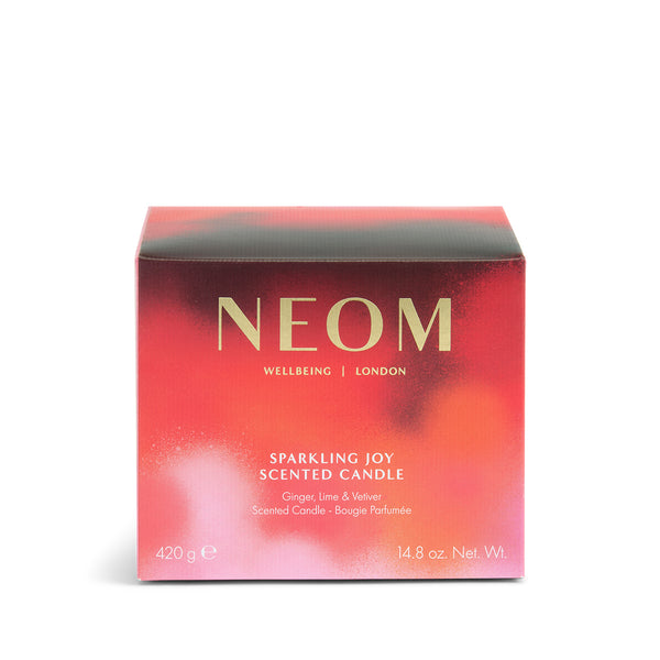 NEOM Sparkling Joy scented candle packaging on a white background