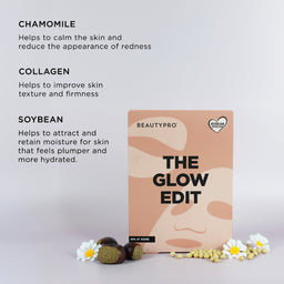 A beauty product package labeled BEAUTYPRO THE GLOW EDIT stands on a light gray background with descriptive text for chamomile, collagen, and soybean benefits. The package is peach and beige with black lettering, and small chamomile flowers and capsules are placed around the base.