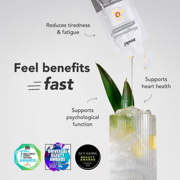 Zooei Magnesium supplement pouch shown with a dropper pouring the liquid into a clear ribbed glass containing a pale yellow drink and green leaves, on a light gray background with marketing text and award badges.