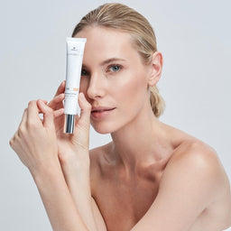 Model holding ALLSKIN MED SUN Mineral Colour SPF50+