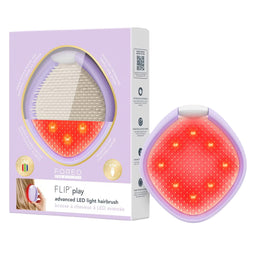 FOREO FLIP play advanced LED light hairbrush shown next to its lavender packaging box on a white background.