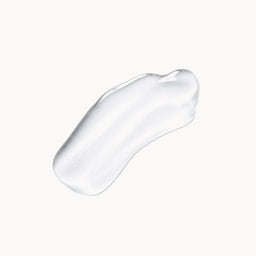 A glossy, translucent smear of clear cosmetic gel or serum on a solid off-white background.