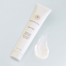 Innersense repair mask tube with a sample on a light gray background