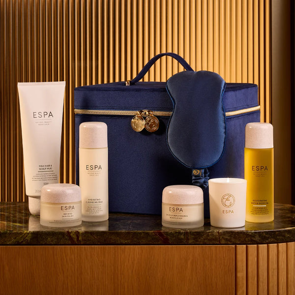 ESPÓa skincare products with a blue bag on a wooden background