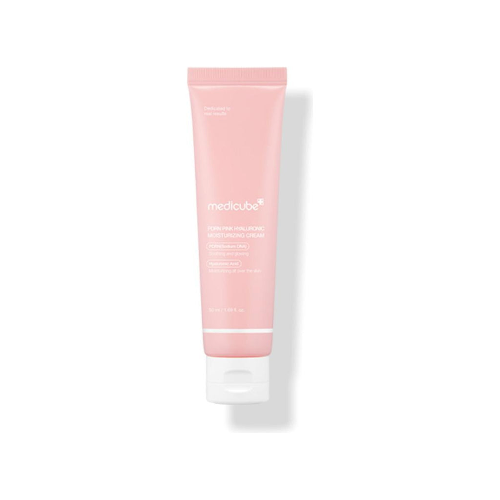 Pink tube of medicube cream on a white background