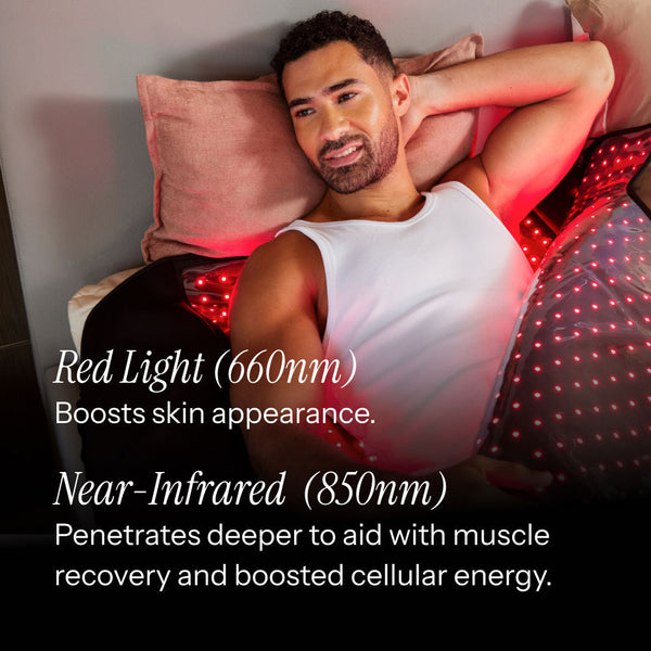 Man lying on a massage table with red light therapy equipment, text about benefits of red light and near-infrared therapy.