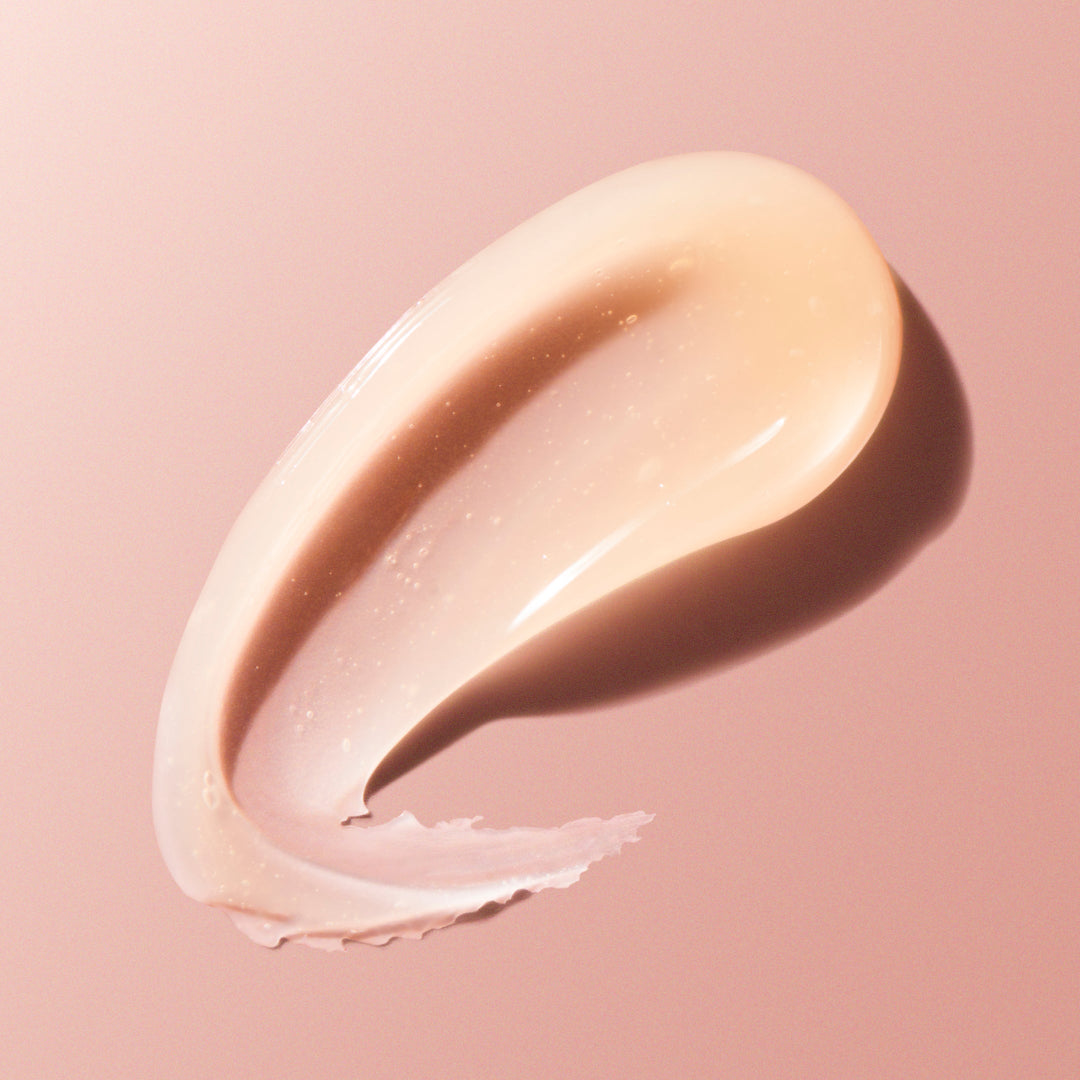 Beige cream swatch on a pink background