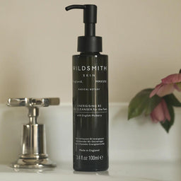 Wildsmith Skin Energising Gel Cleanser 100m on side of bath